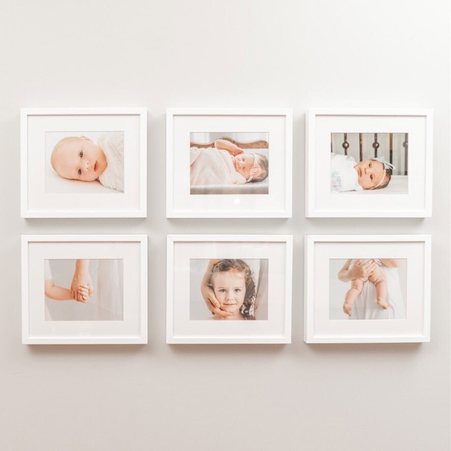 Image of wall gallery with white frames