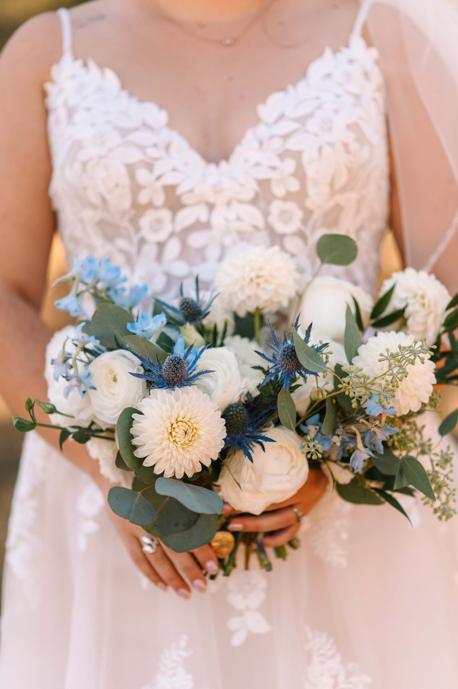 Bride holding her floral bouquets