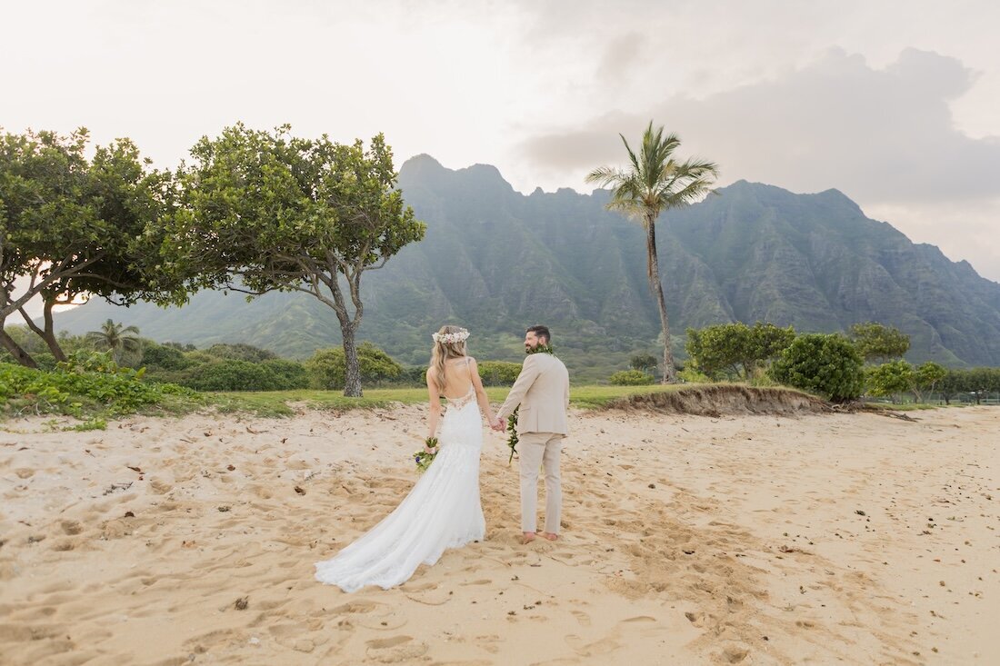 Oahu Beach Wedding Venues featuring a bride and groom 