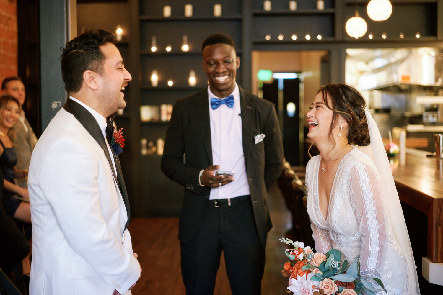Bride and groom laughing at Cathedral, Ballard.