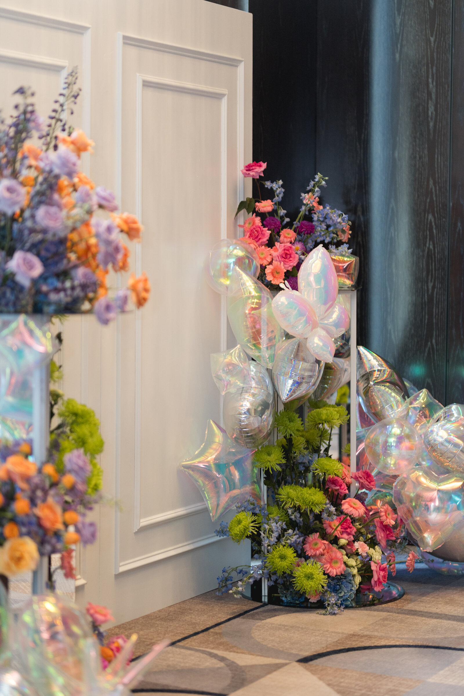 Clean and modern floral styling for the entryway of a private event. Designed by The Floral Eclectic to make a bold first impression using minimal, impactful blooms.