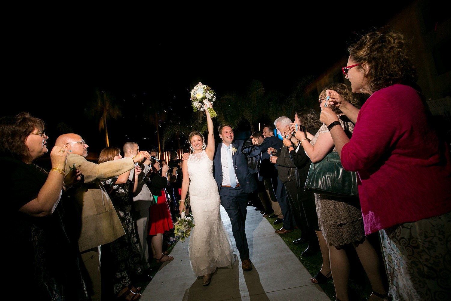 night shot at ocean view room bride and groom