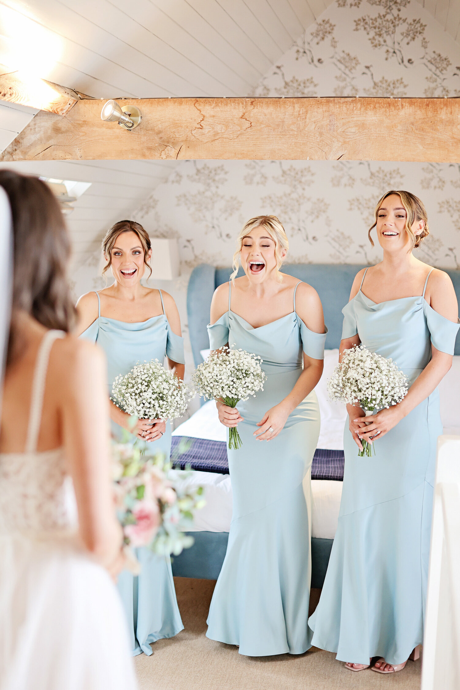 South-Farm-wedding-venue-bride-first-look-with-bridesmaids