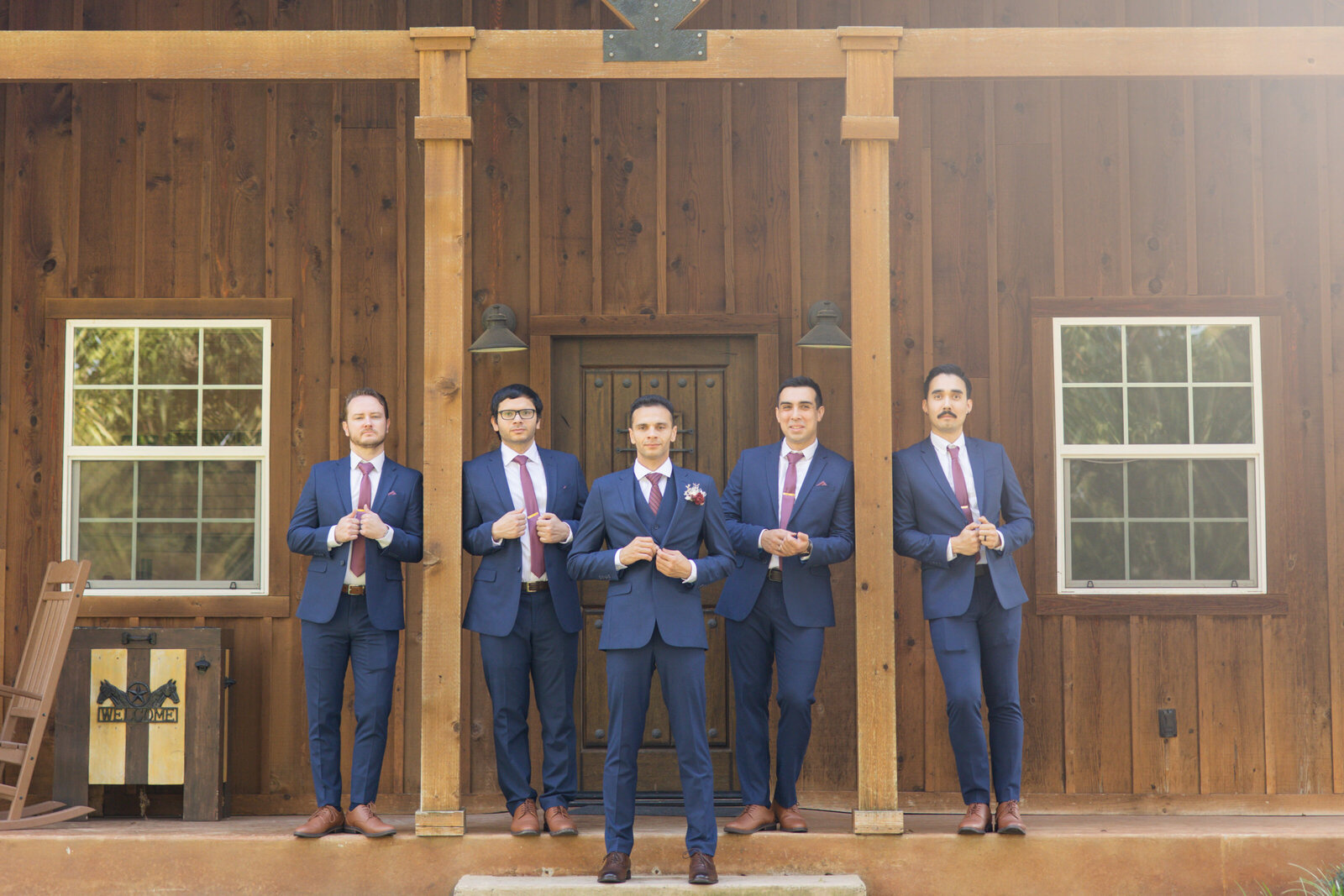 Groomsmen and groom group photography before ceremony