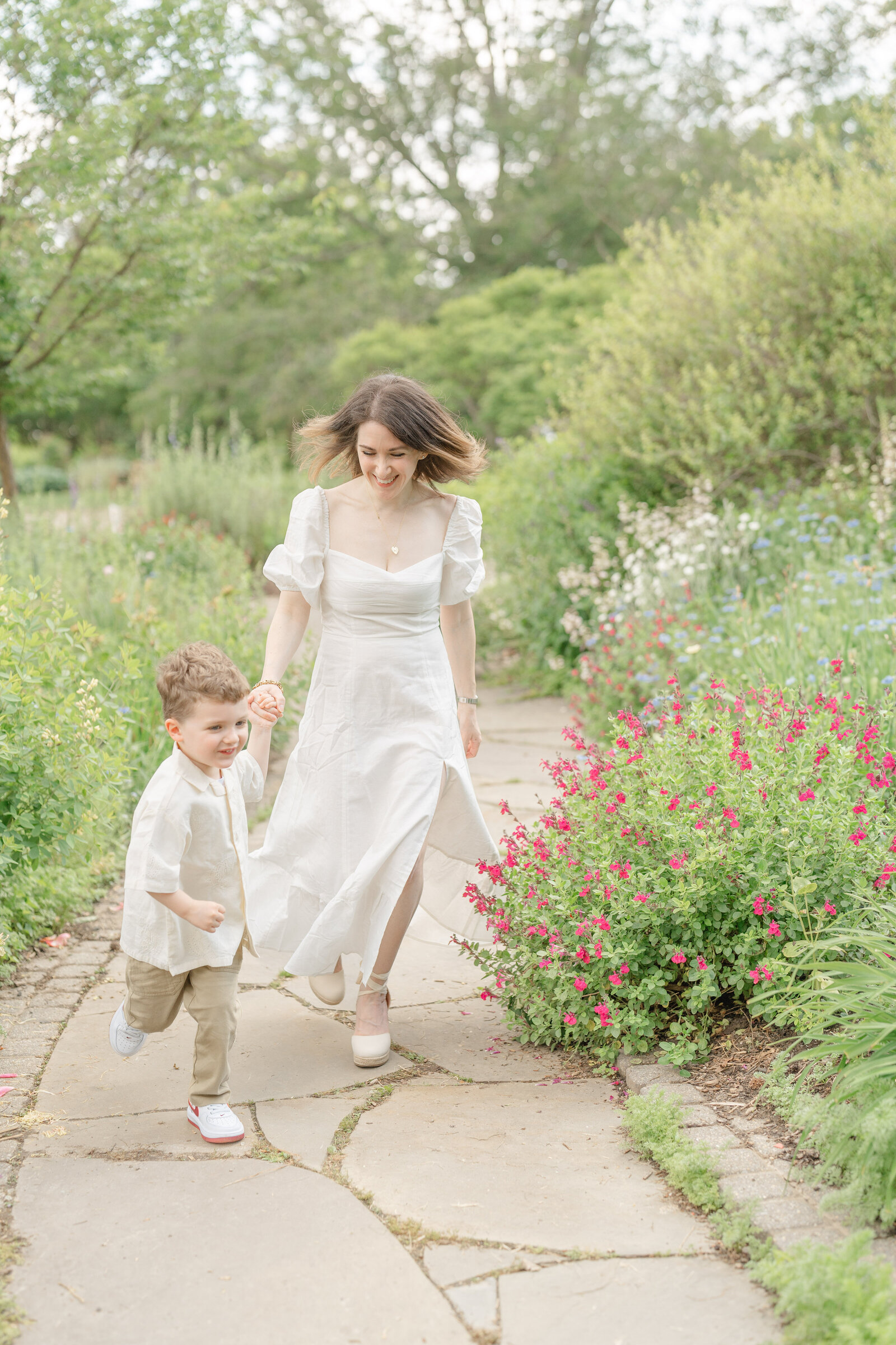 mom running with son during Centreville, Virginia spring mini session