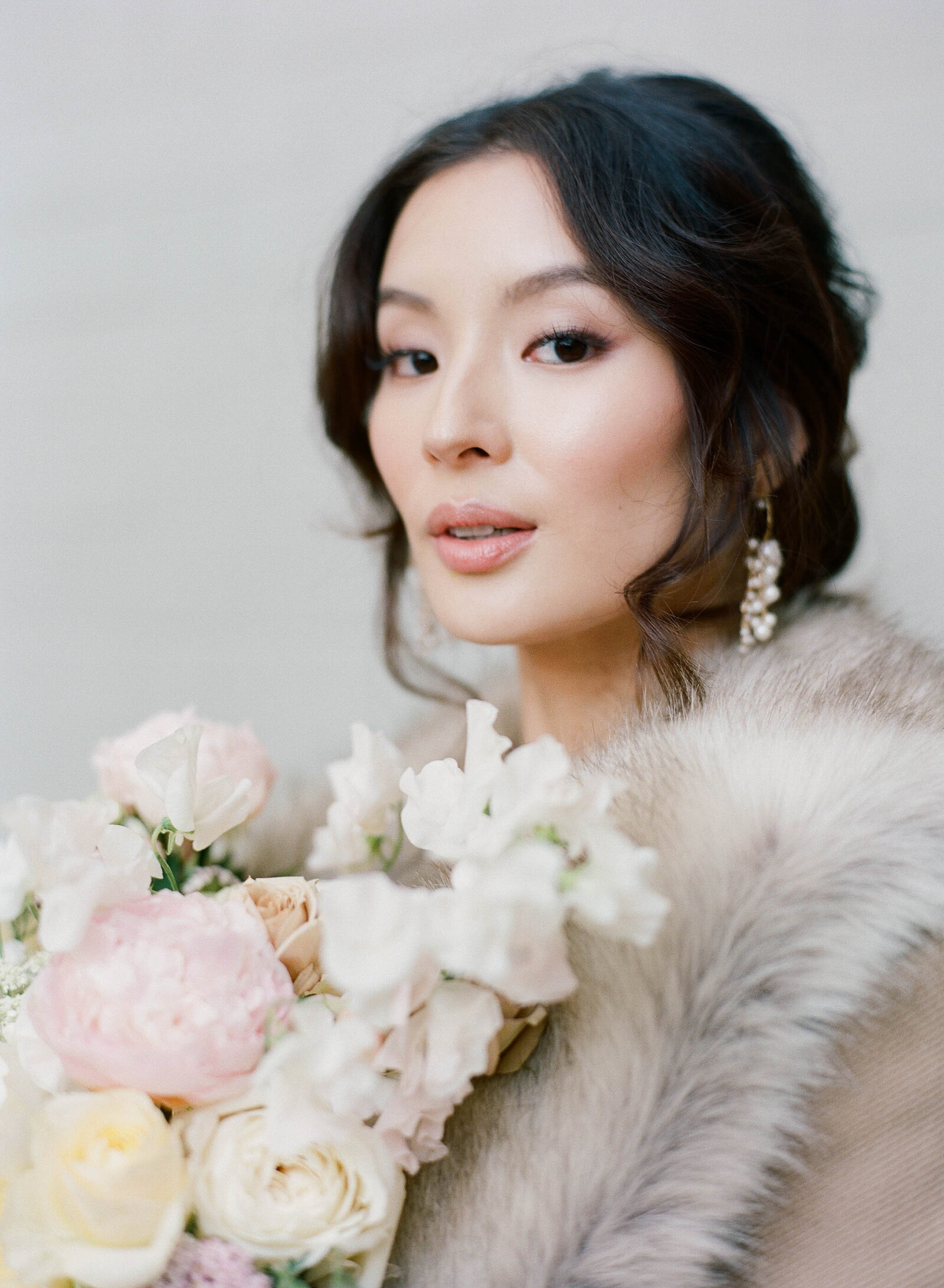 Bride with soft romantic updo at San Francisco Fairmont wedding