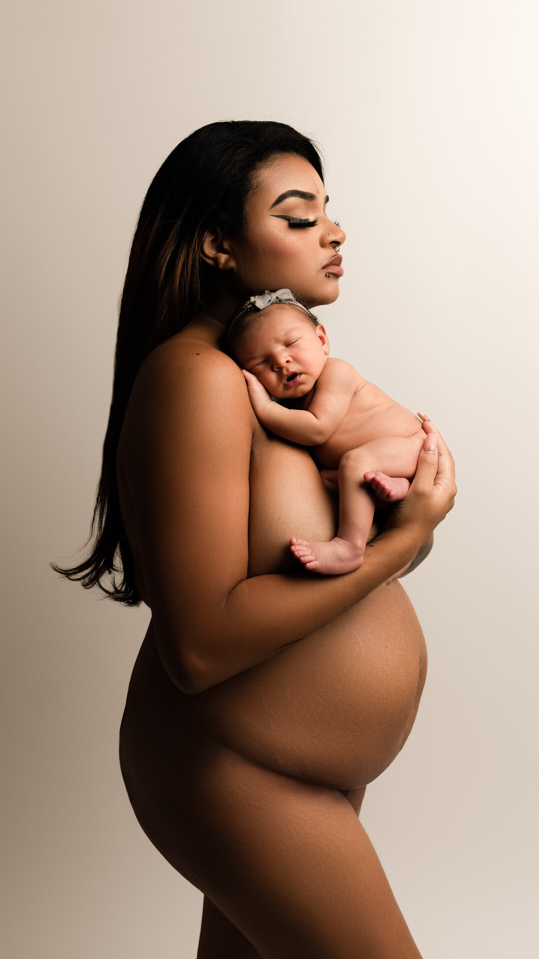 Newborn baby with mother skin to skin photography.