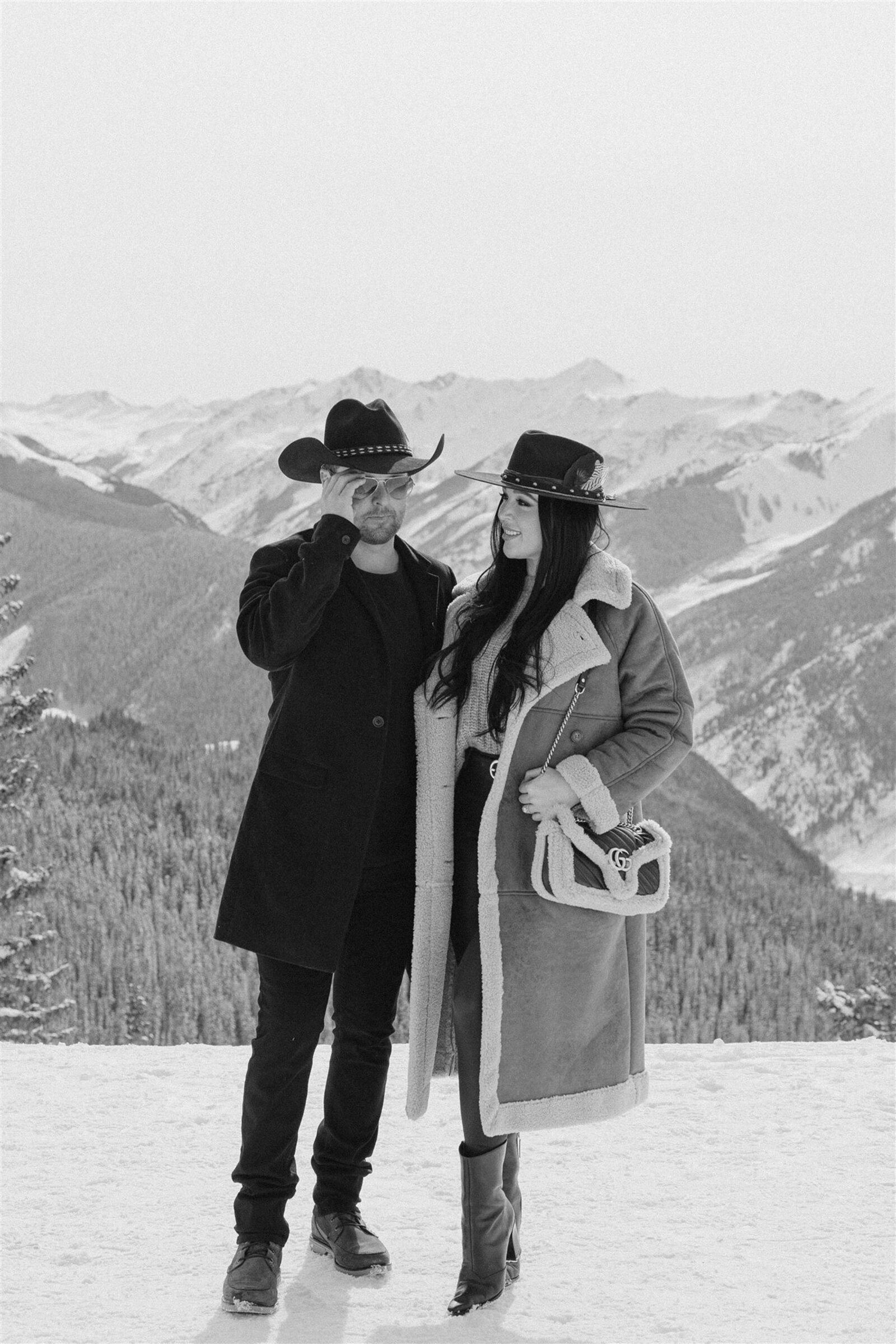 Fashion-forward winter engagement outfits in Aspen, Colorado
