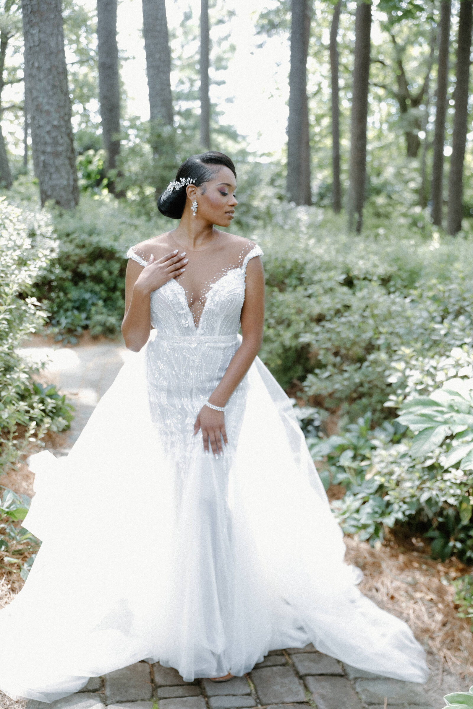 Romantic bridal portrait in a garden setting, planned by a luxury wedding planner in Raleigh, NC.