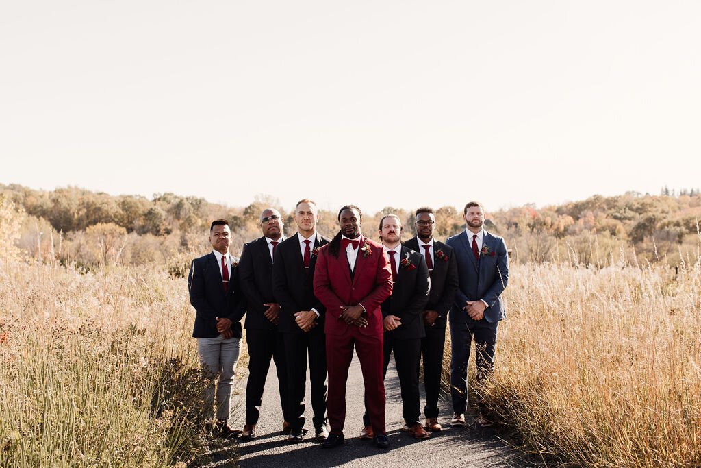 groomsmen-groom-red-tux-black-suit