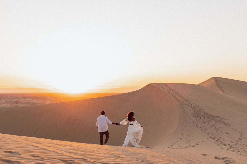 new jersey wedding photo by Blooming Faith Photographyof bride and groom in desert