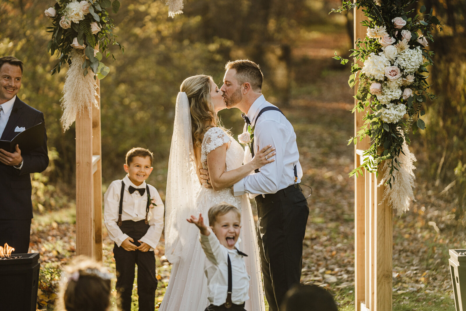 little boy photobombs first kiss at wedding