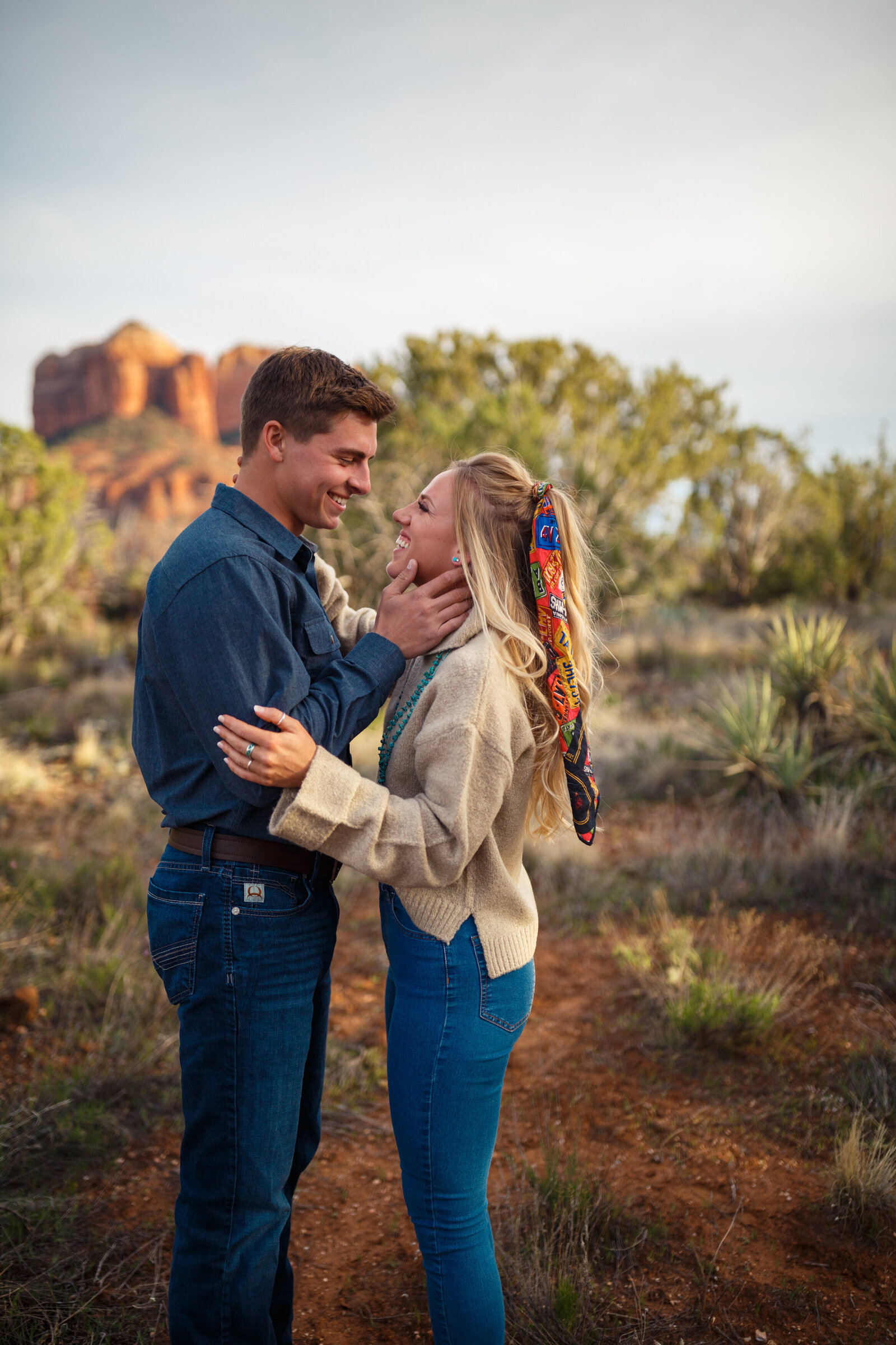 country western couple laughing together in sedona