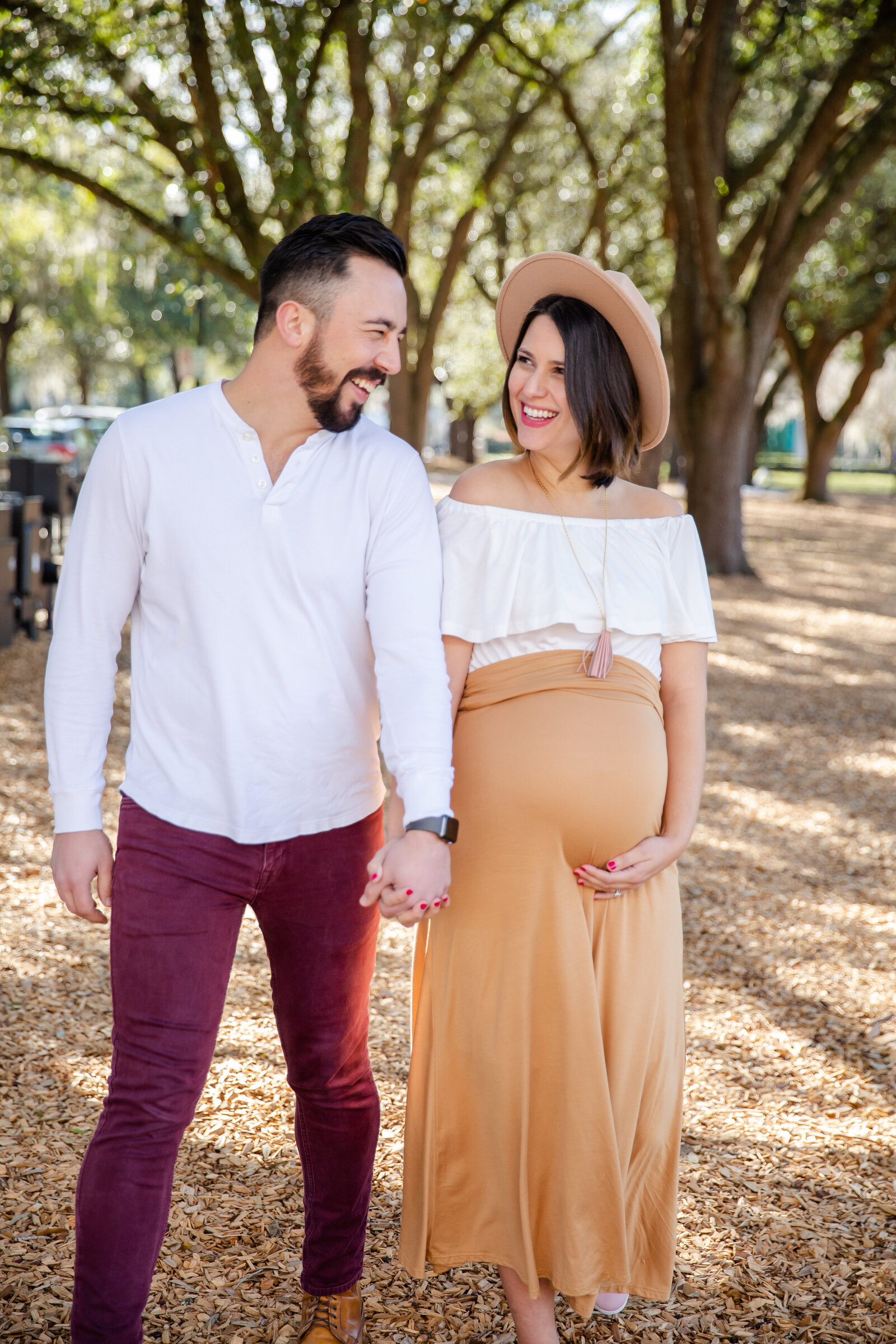 Husband and wife expecting photoshoot with Riley James.