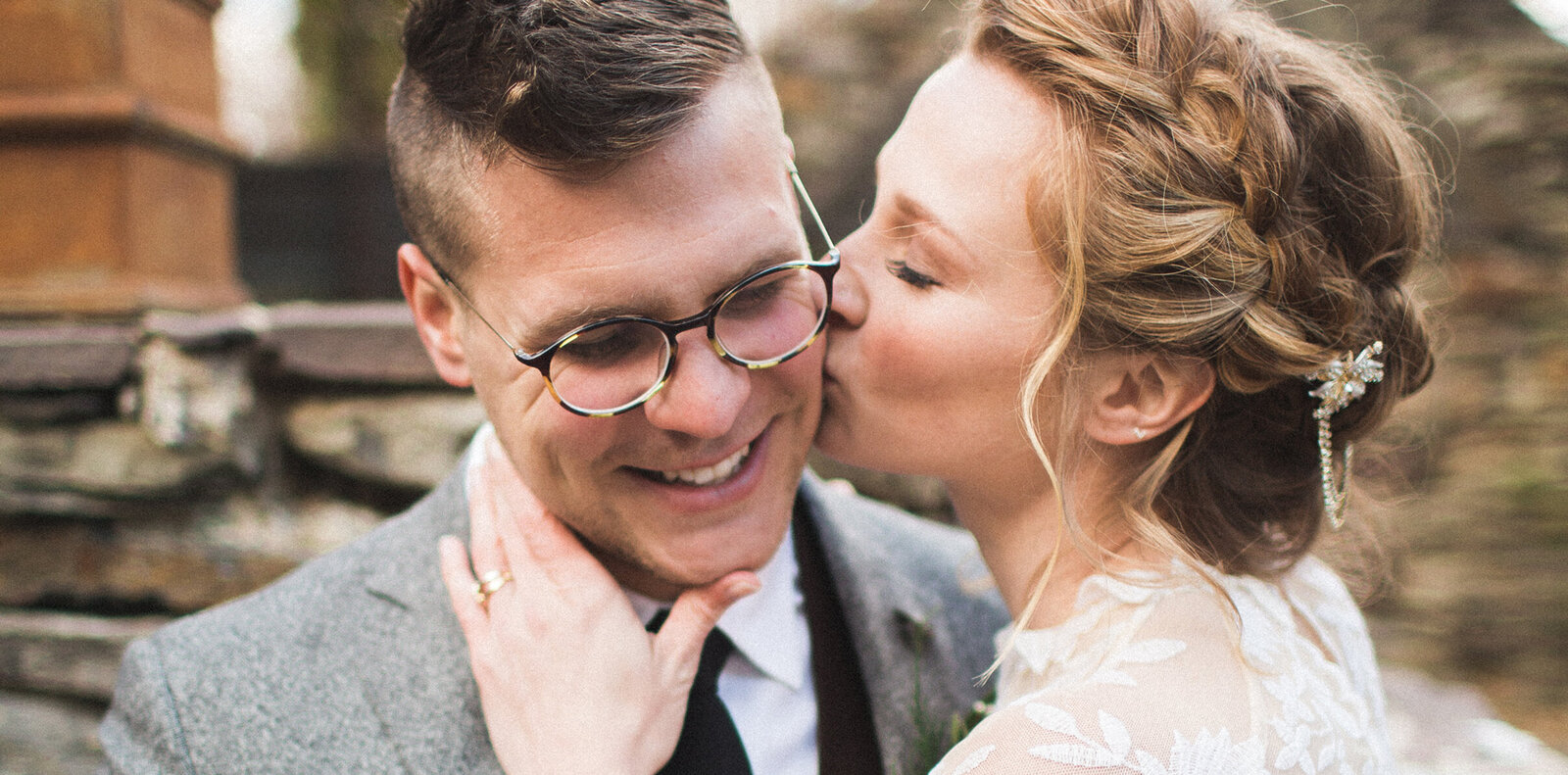 bride and grooms sharing a kiss at The Gables by Philadelphia wedding photographer Samantha Jay