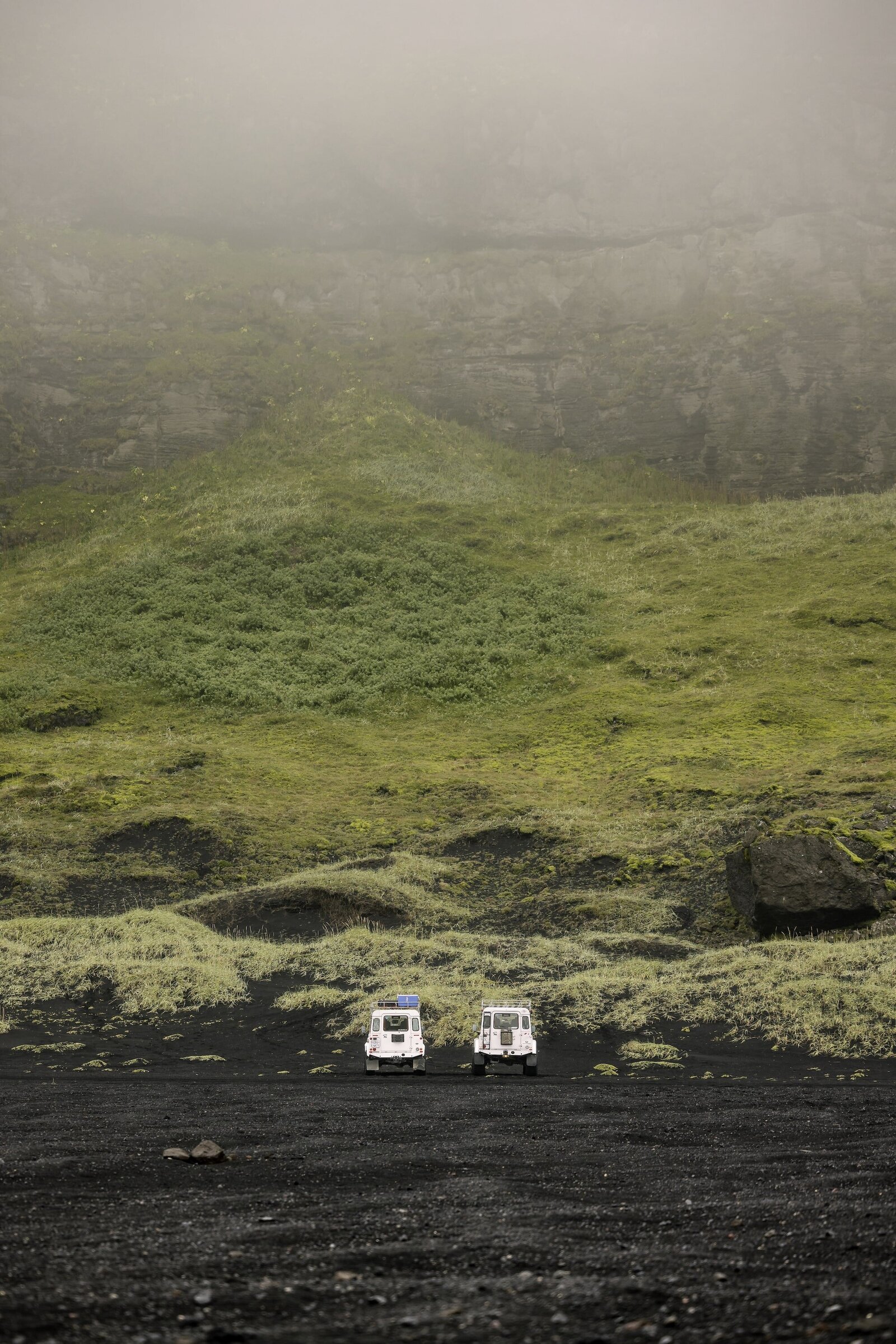 land cruisers in mountains at Iceland destination wedding