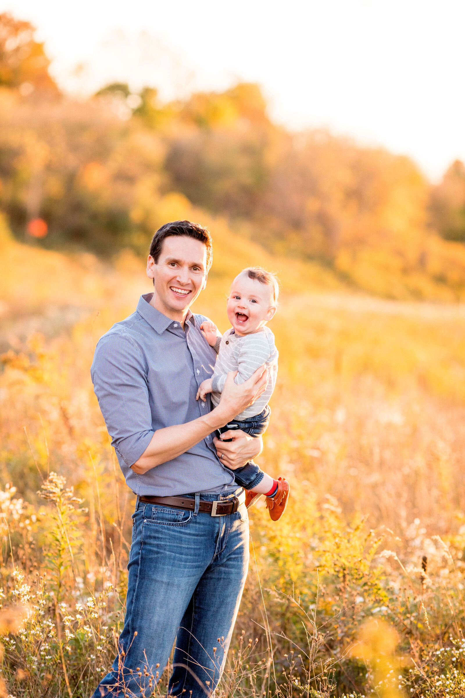 Father and son smile along Komoka Provincial Park trail