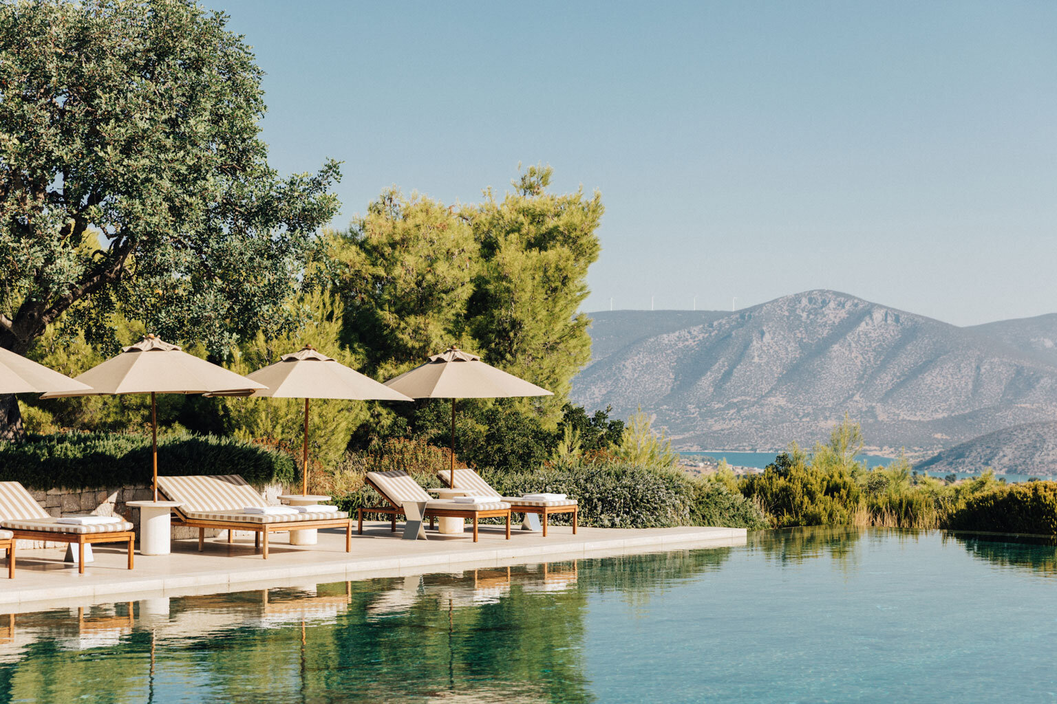 Amanzoe,-Greece---Resort-main-swimming-pool,-Pool-loungers_27097