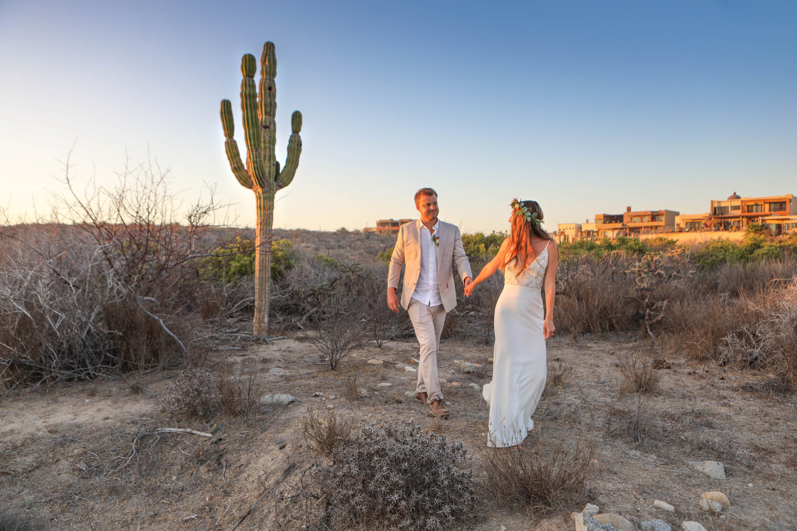 Stunning mexican desert provides beautiful backdrop for golden hour portrait of bride and groom