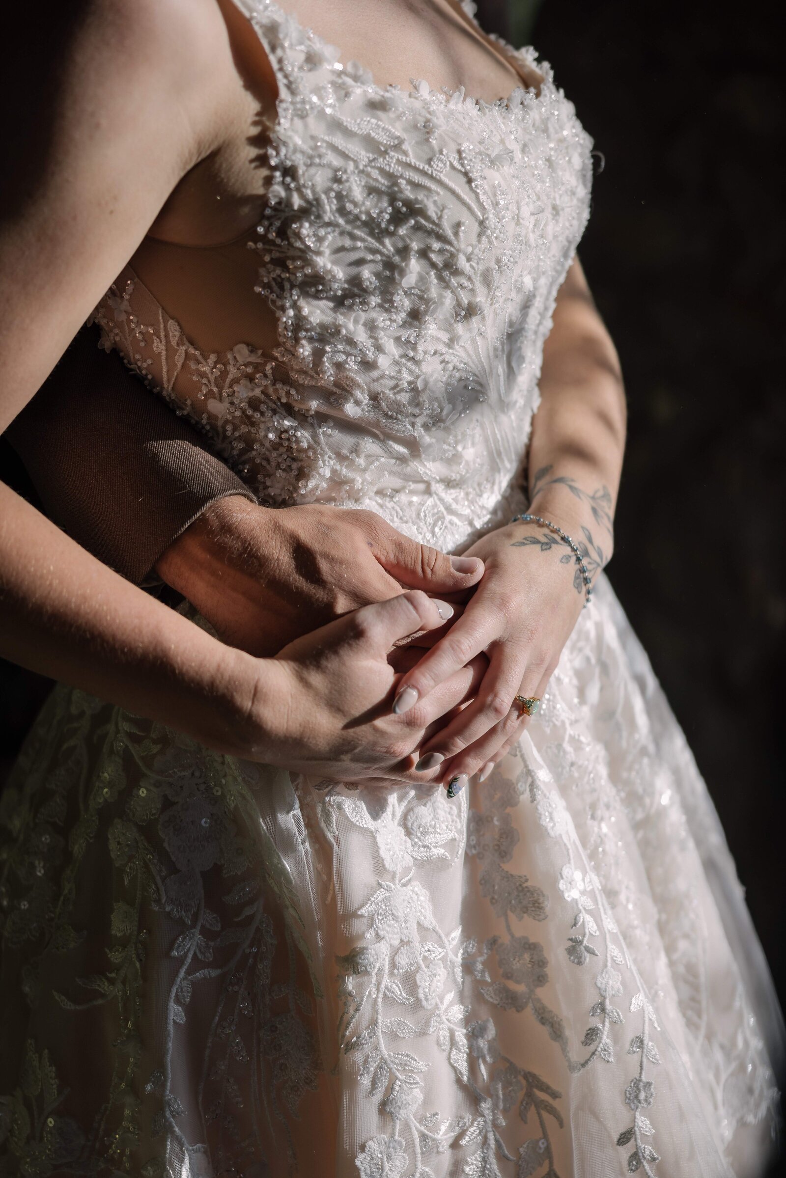 bride and groom holding hands