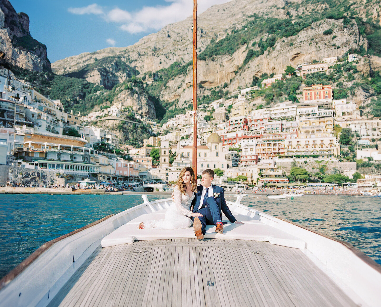 Bride and groom wedding day boat ride in Positano
