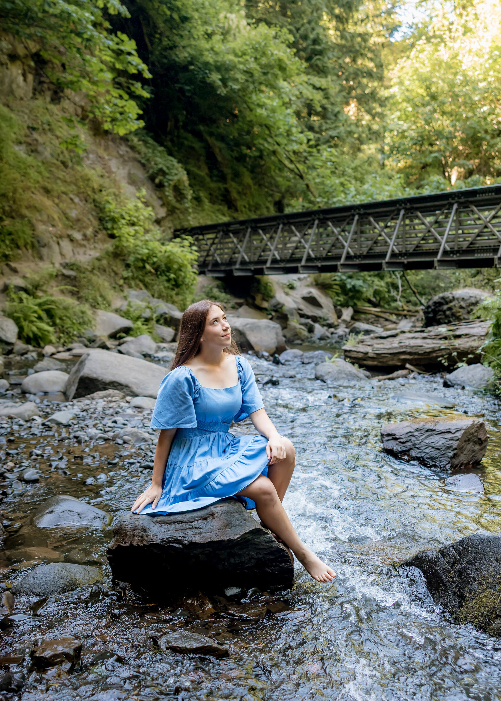 Senior Portraits in a river for Sandy High School Senior in Oregon.