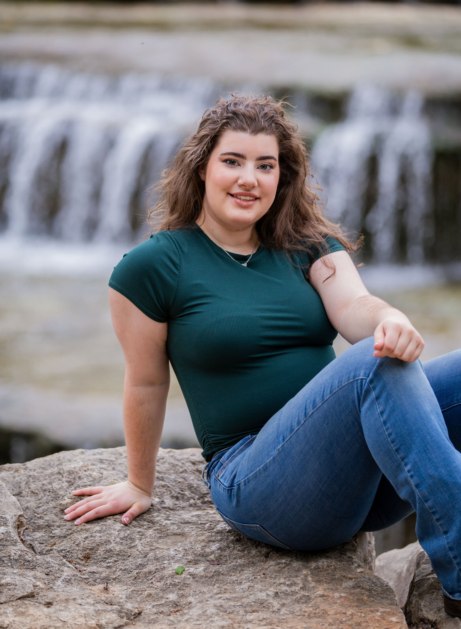senior girl with waterfall