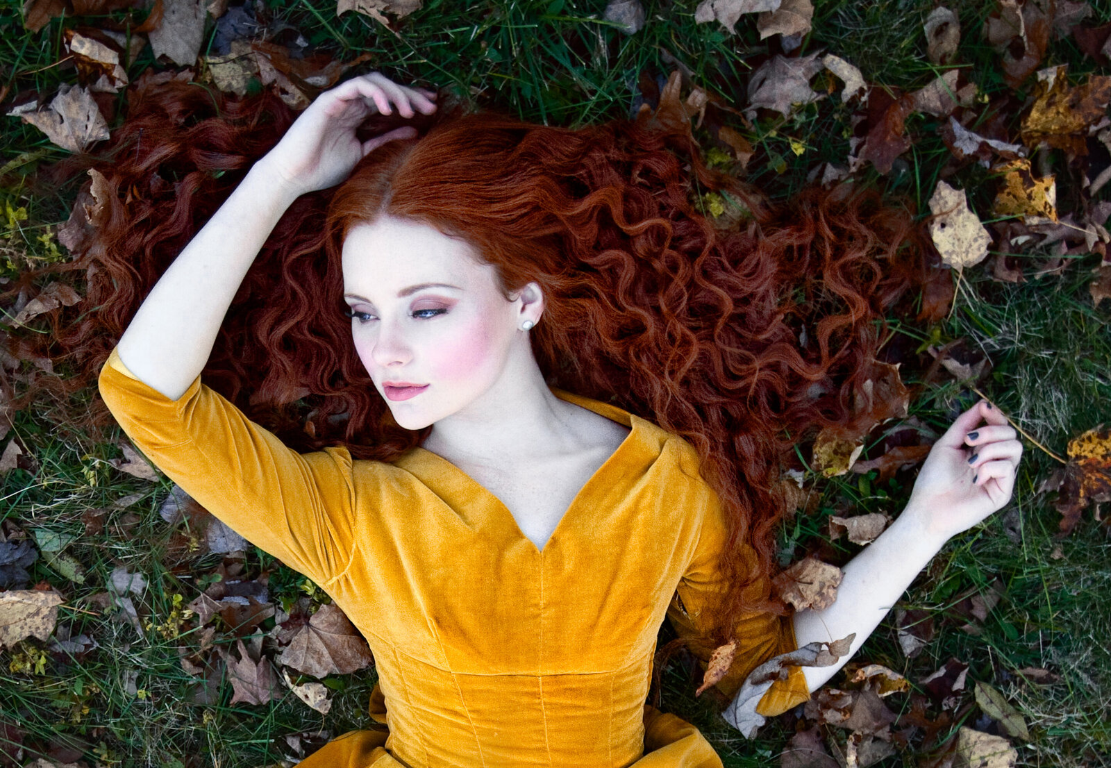 Beauty makeup for a model laying in the leaves