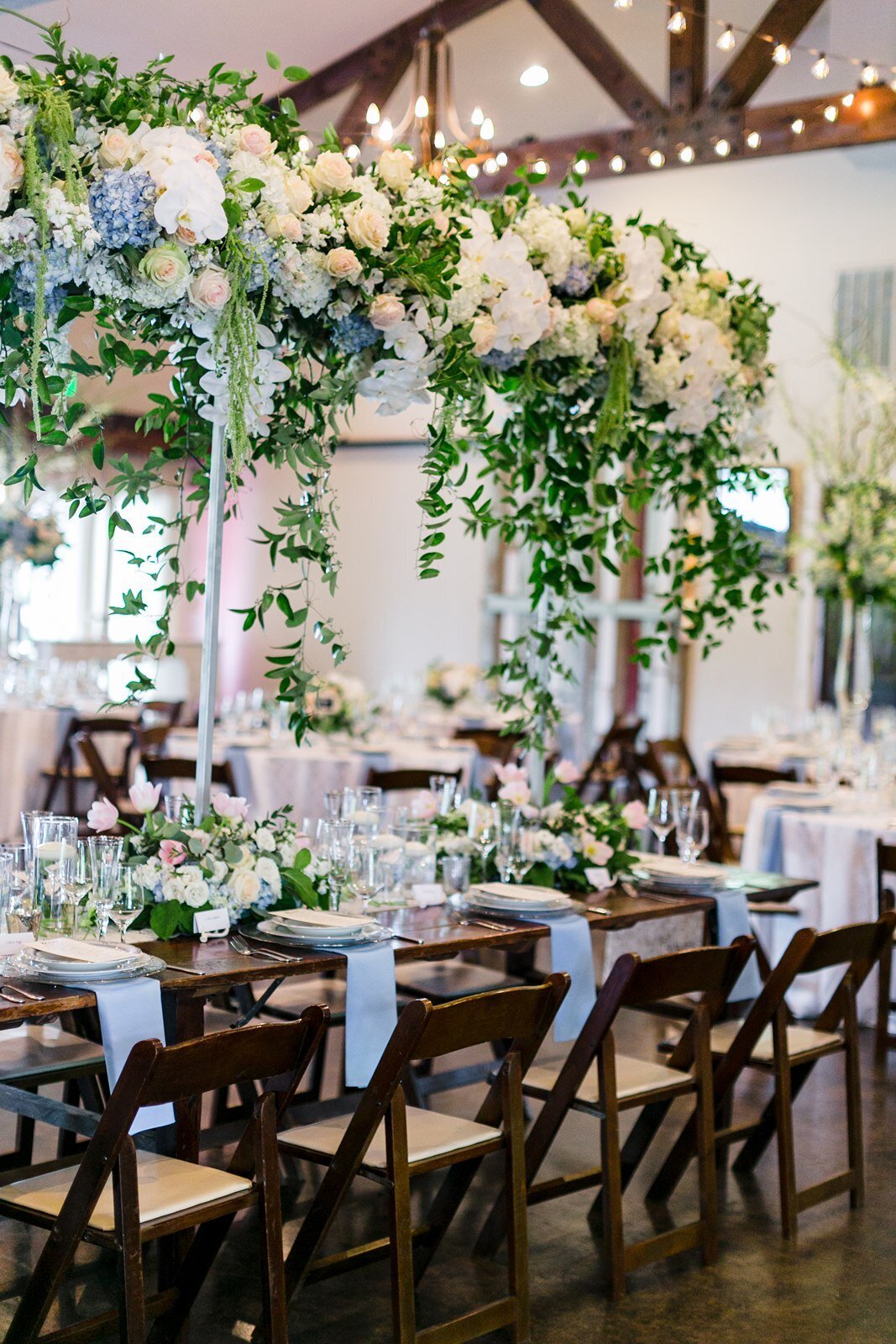 hill-country-wedding-reception-table-hanging-flowers