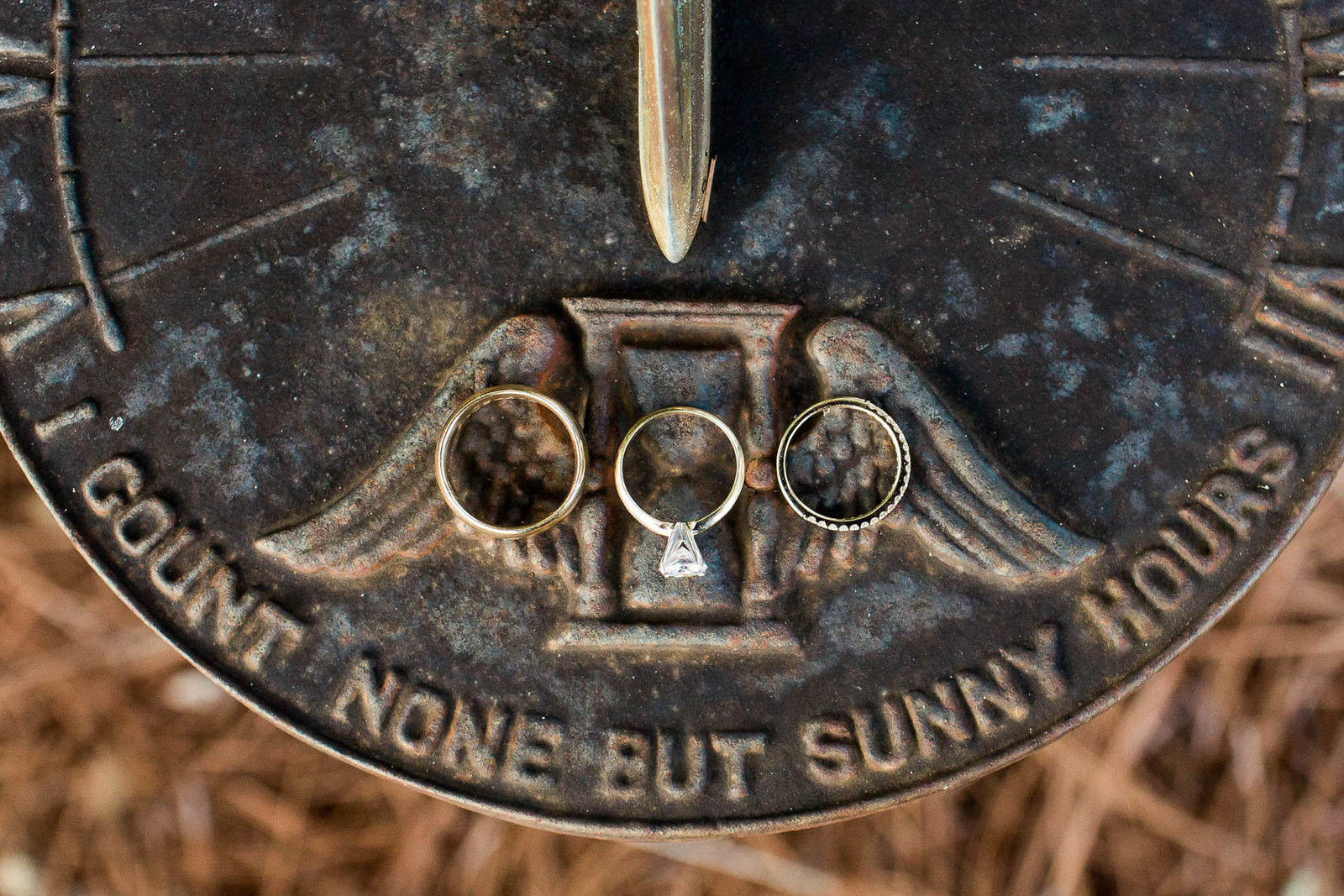 Rings rest on antique sundial, Oakland Plantation, Mt Pleasant, South Carolina