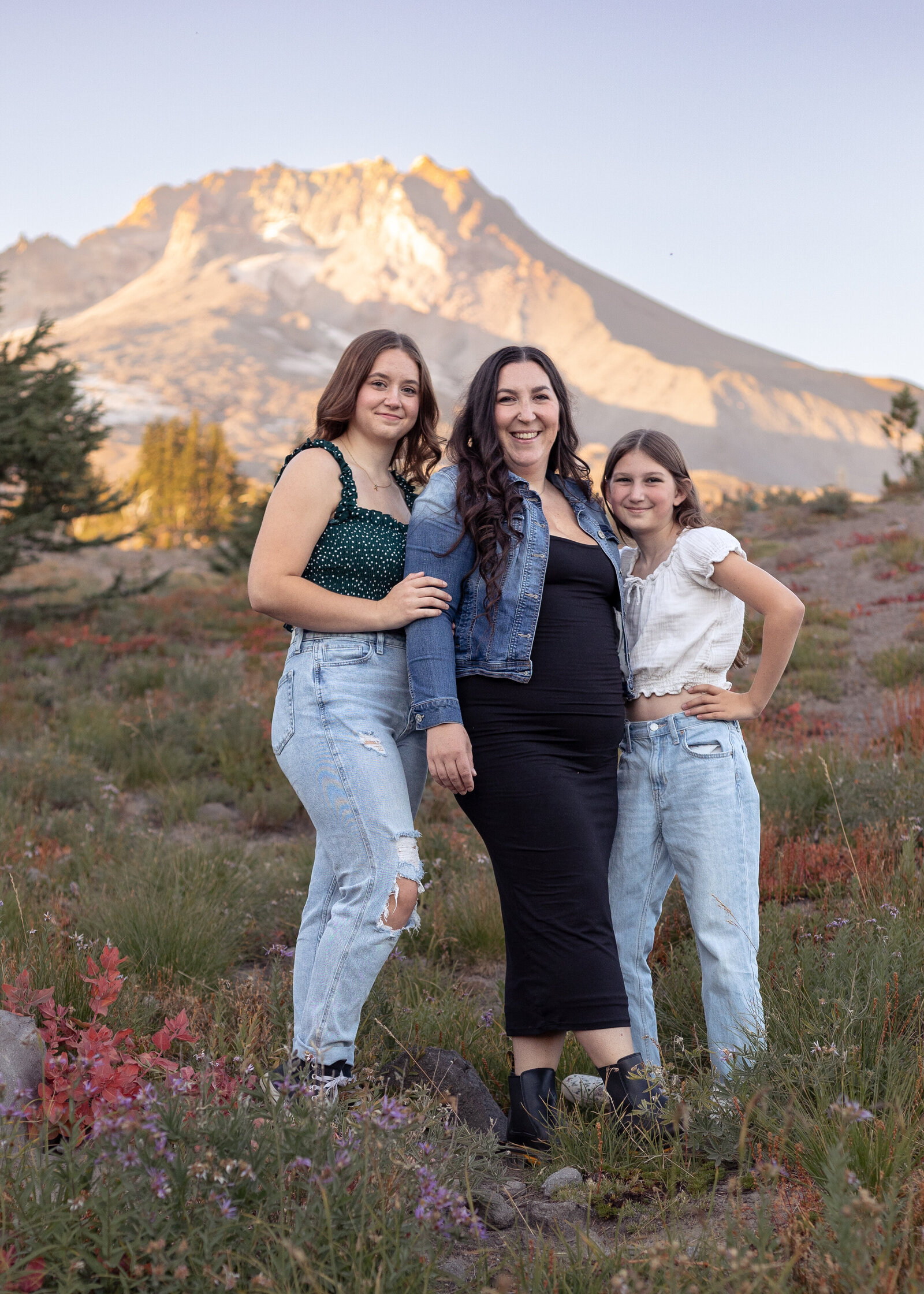 Mom and 2 daughters in front of Mount Hood at Timberline Lodge