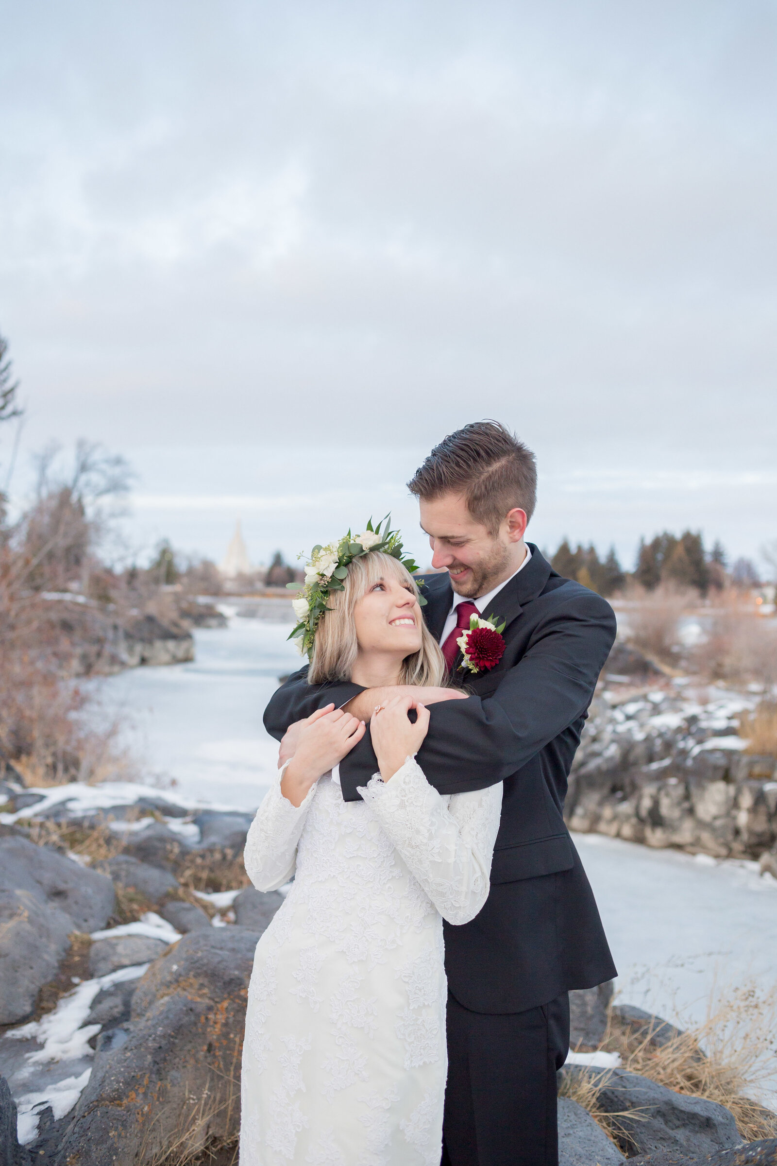 Idaho Wedding Photographer captures spring wedding of couple embracing