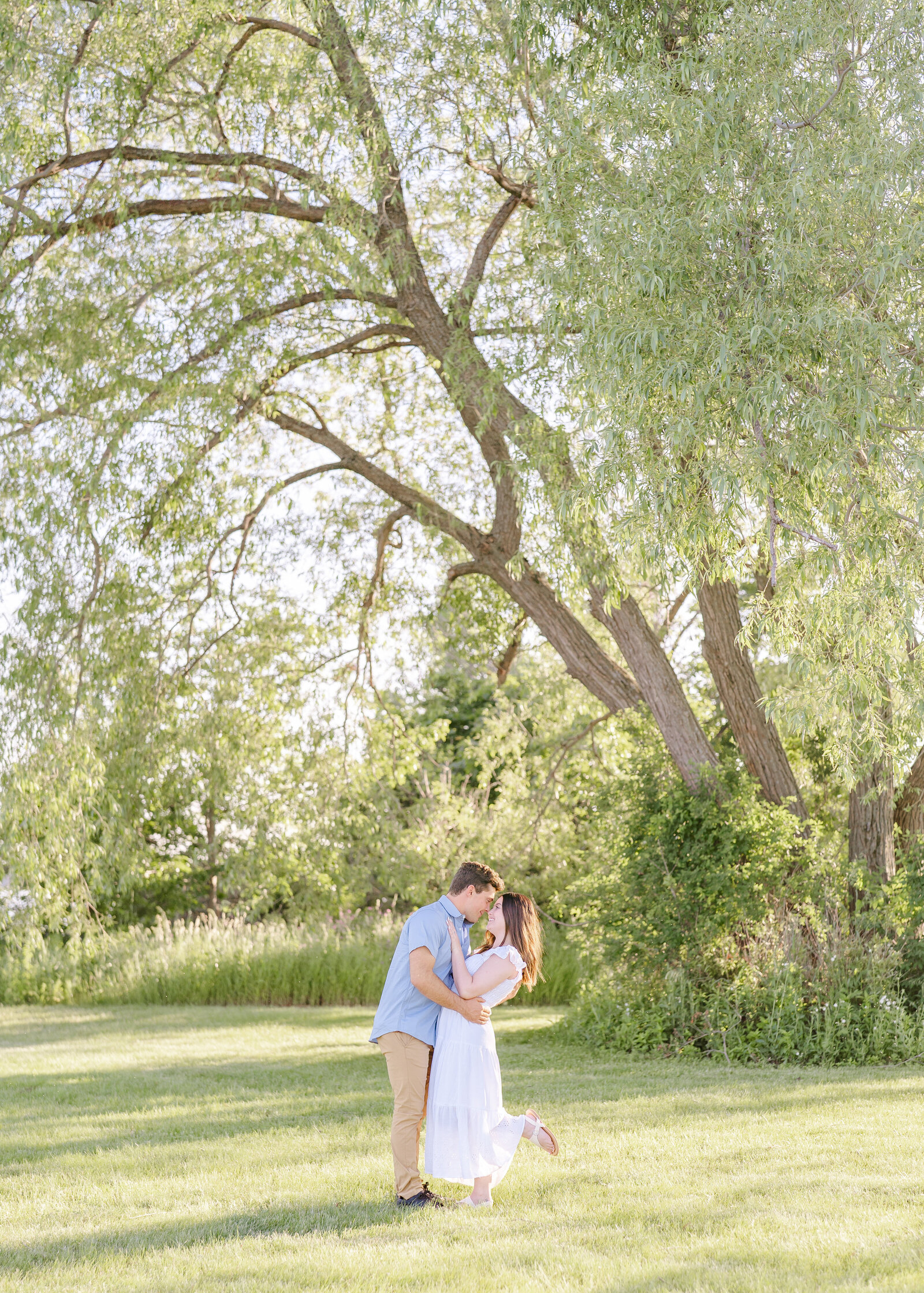 engagement pictures with tree in escanaba