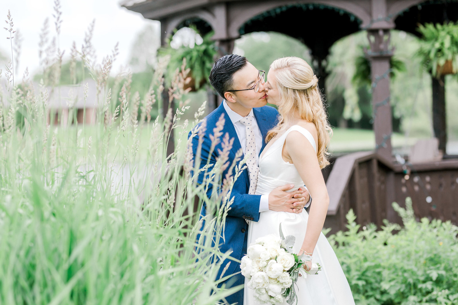 romantic kiss wedding portraits by Chicago wedding  photographer