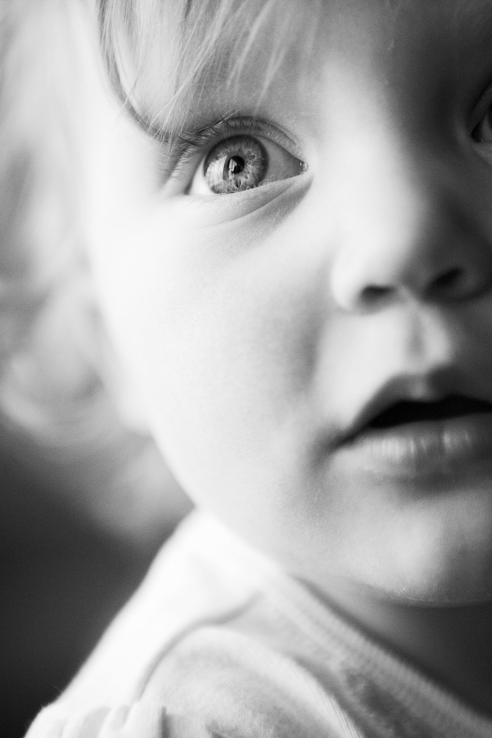 black and white close up of baby girl face