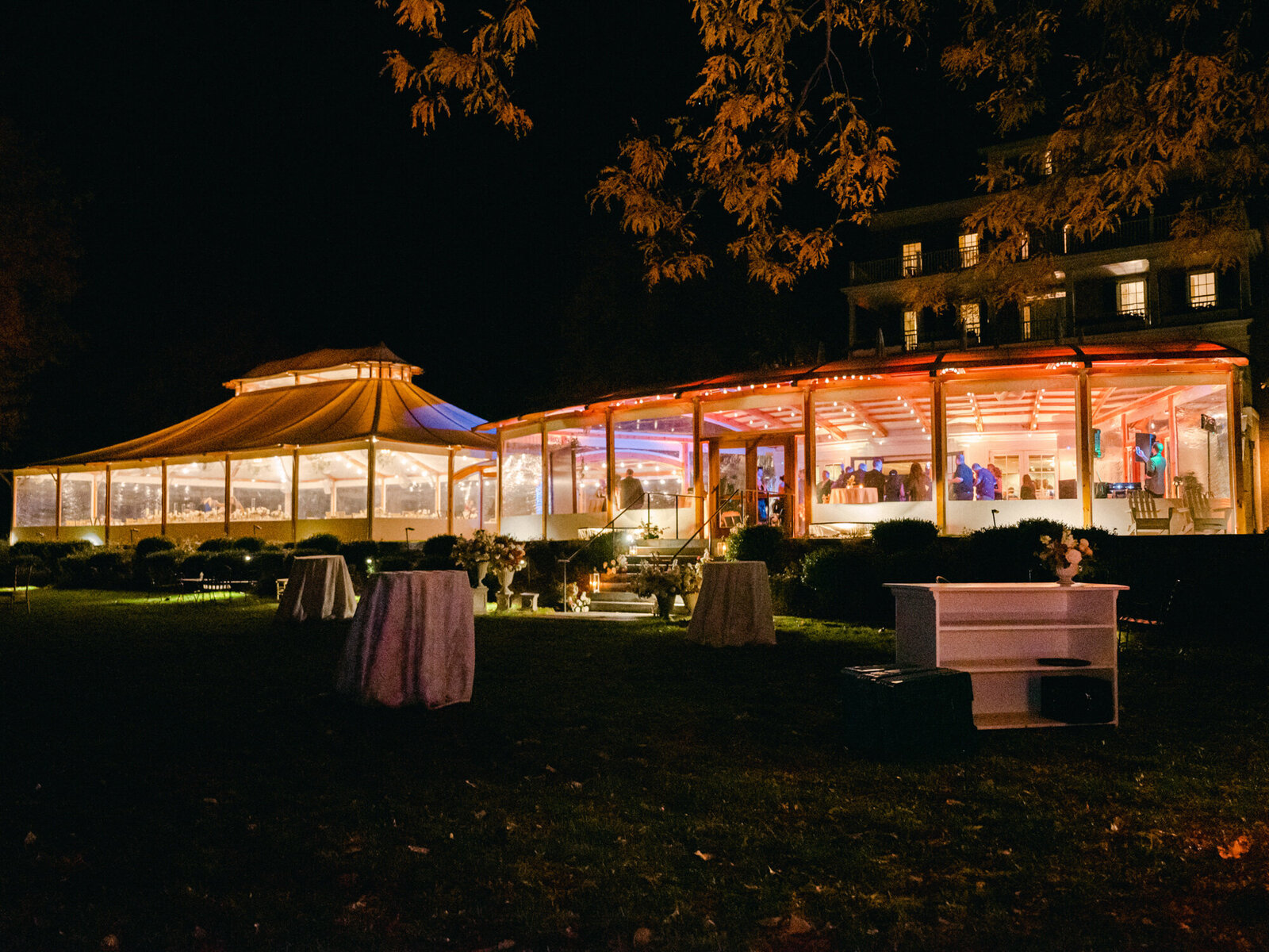 Late night outdoor shot of a glowing Aurora Inn, part of Inns of Aurora in upstate New York.