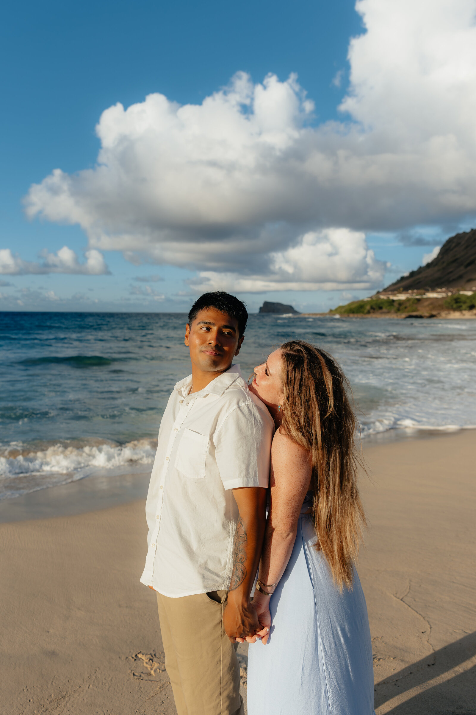 Romantic beach couples session with ocean views in Hawaii