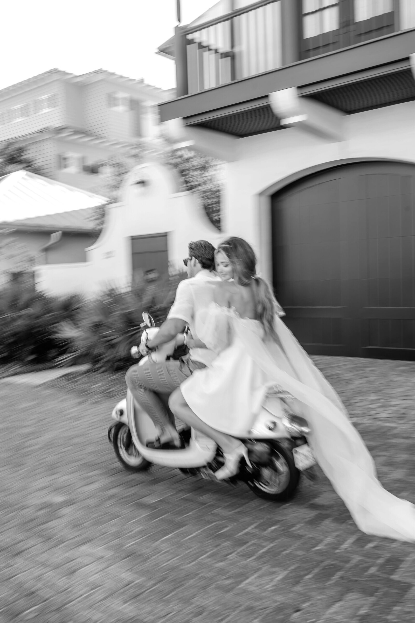 couple drives off on a moped in paris after eloping