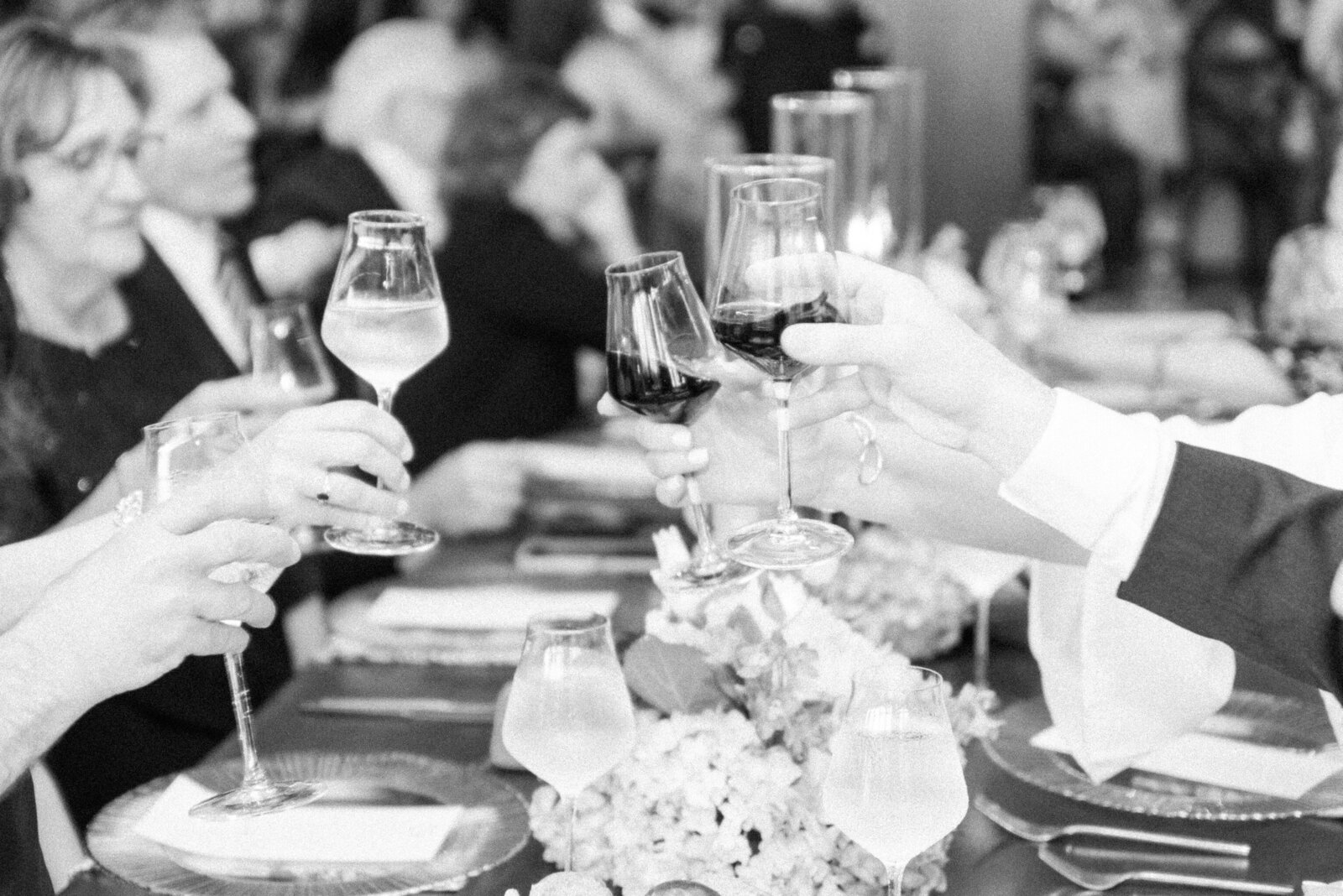 guests toasting on wedding day