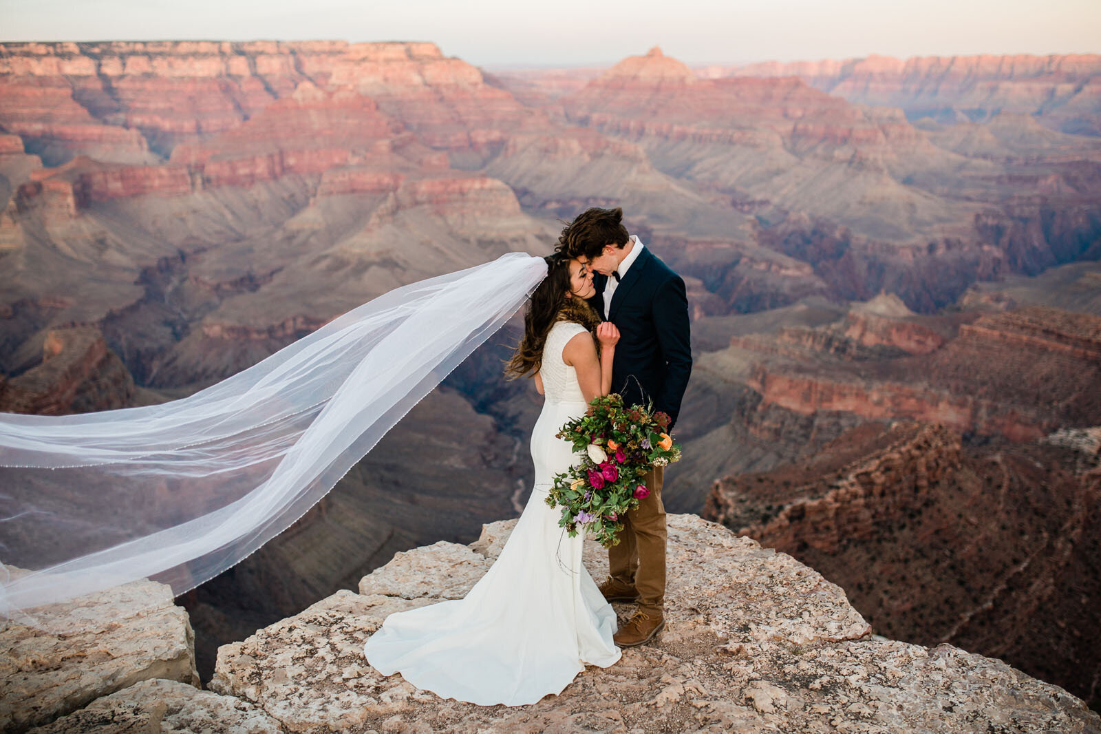 Couple standing in Grand Canyon in Arizona