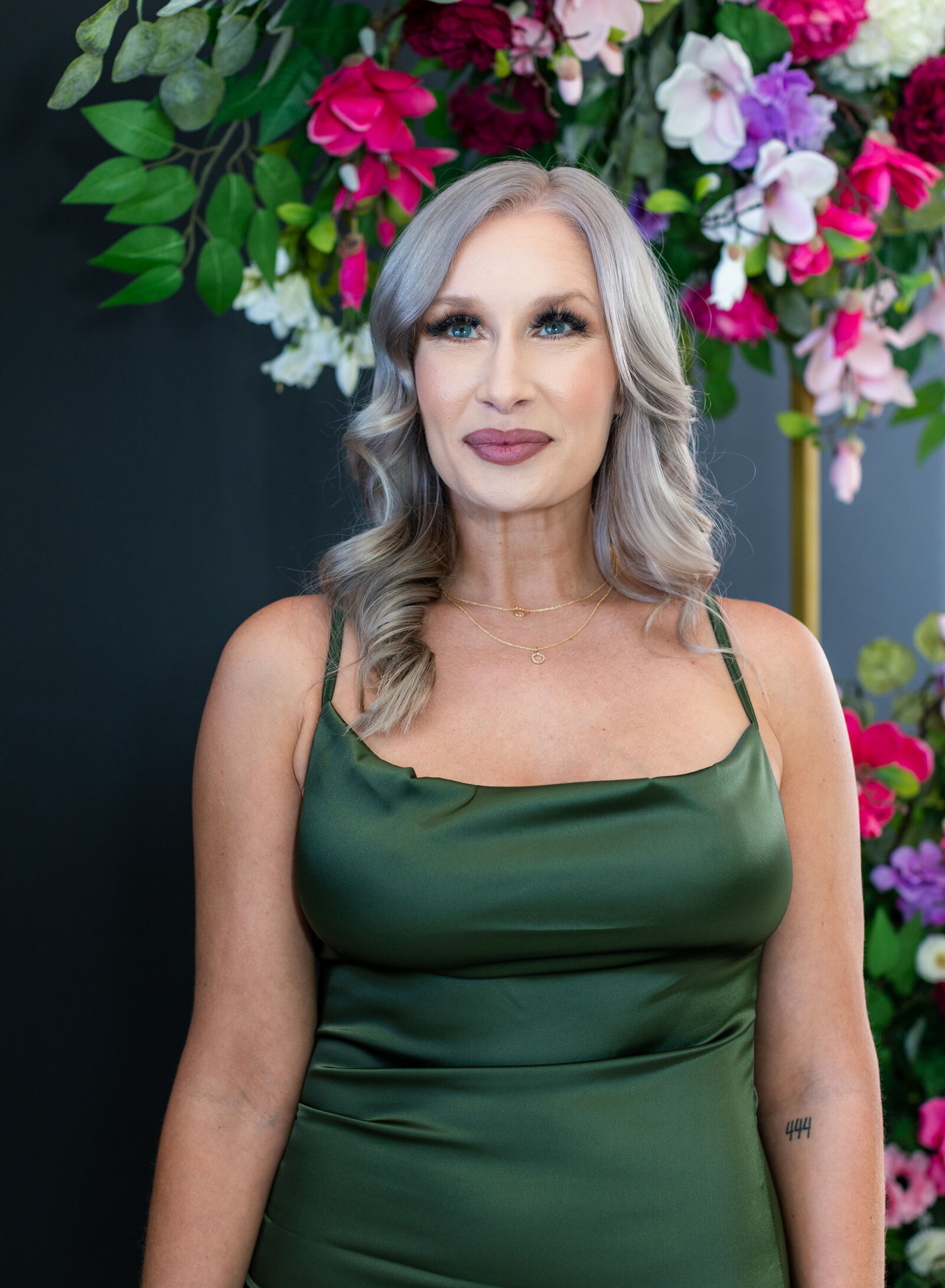 women looking off with flowers