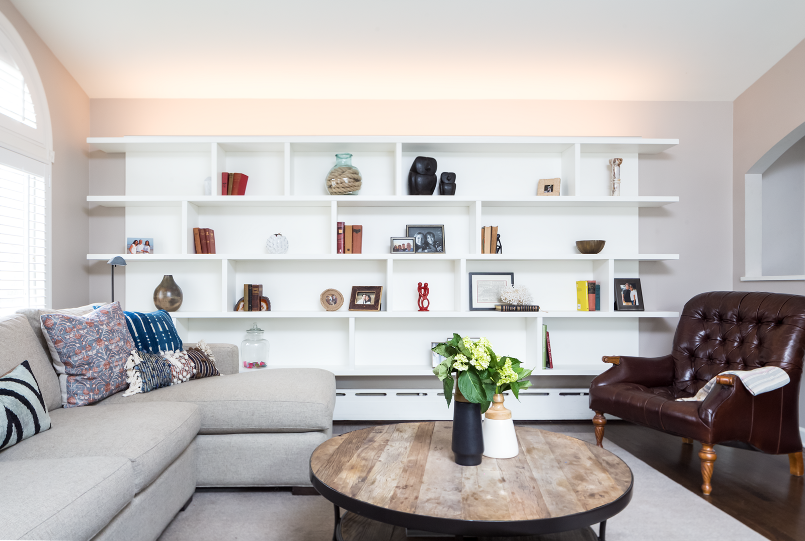 Neutral living room design with built in shelves