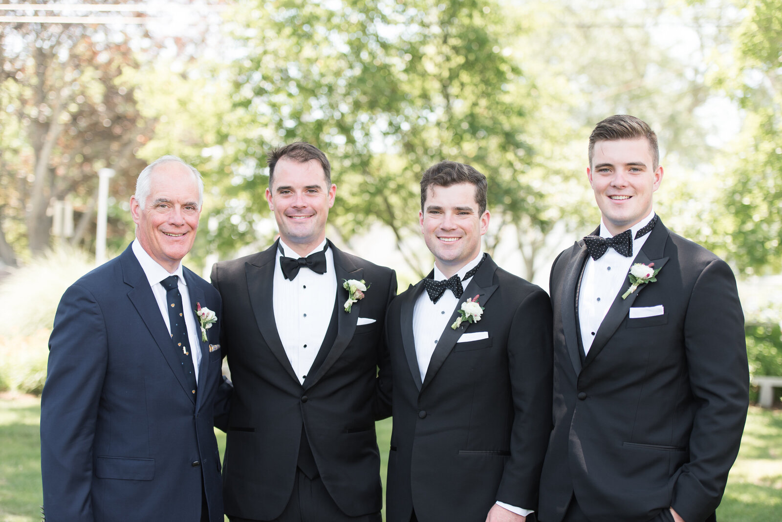 groomsmen black tuxedos