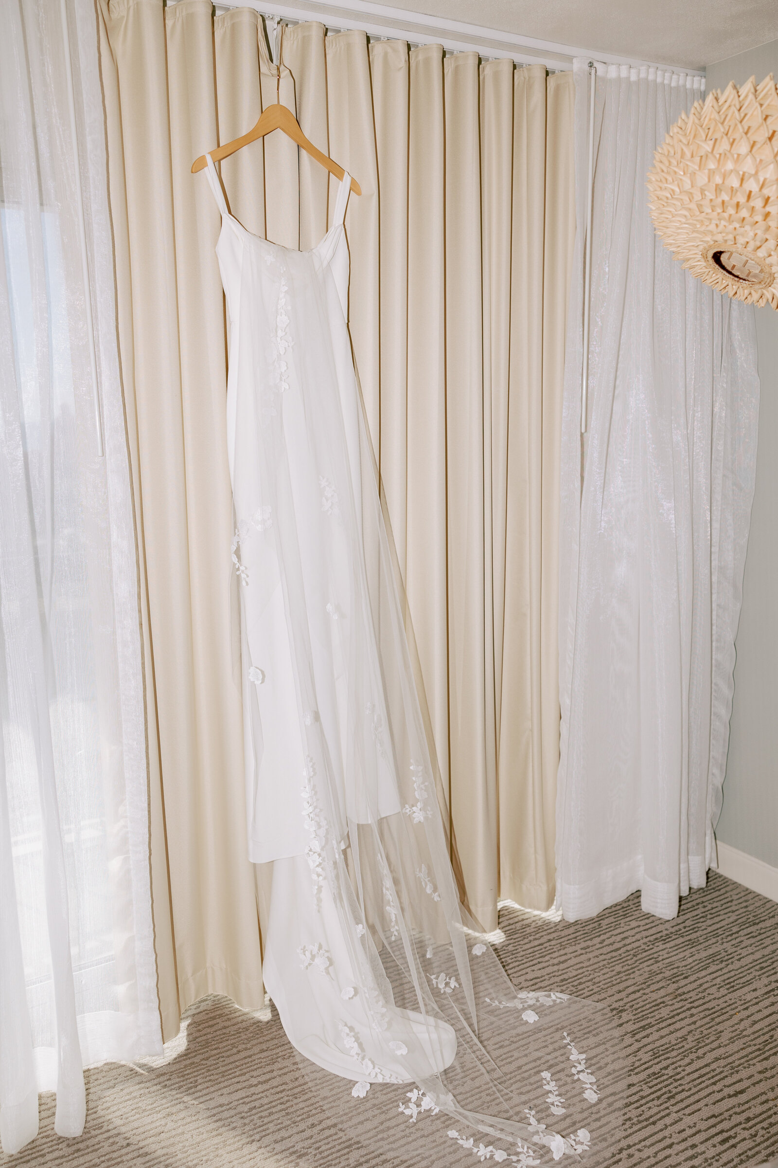 Wedding dress hanging at laylow waikiki