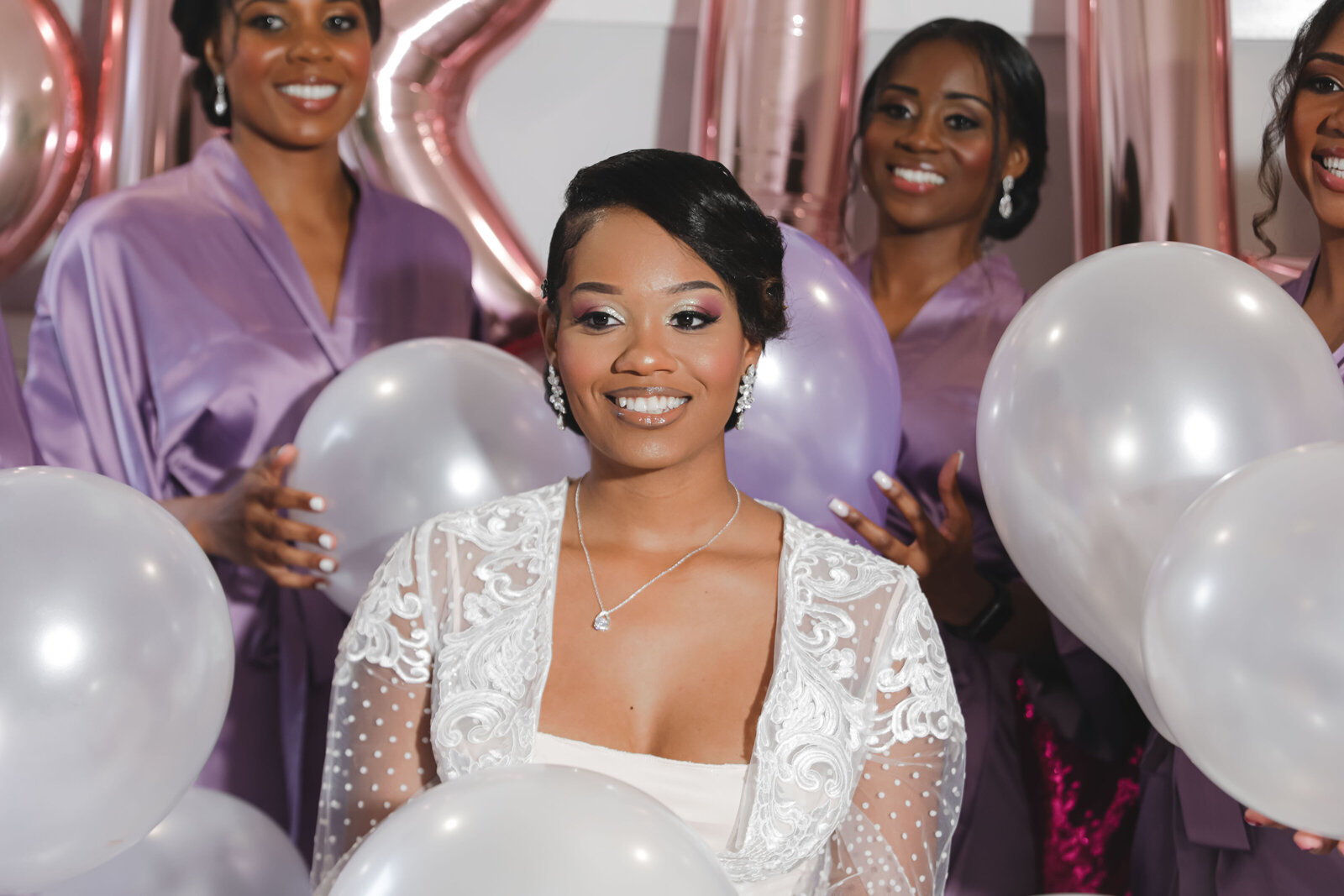 Beautiful bride celebrating her wedding morning with joy, planned by a luxury wedding planner in Raleigh, NC.