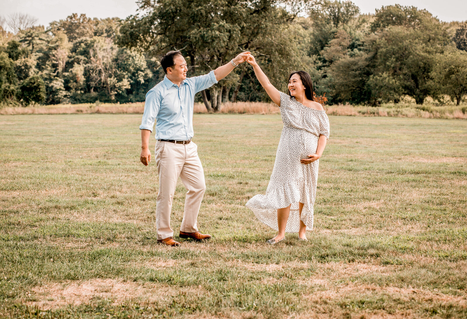 couple dancing on a field