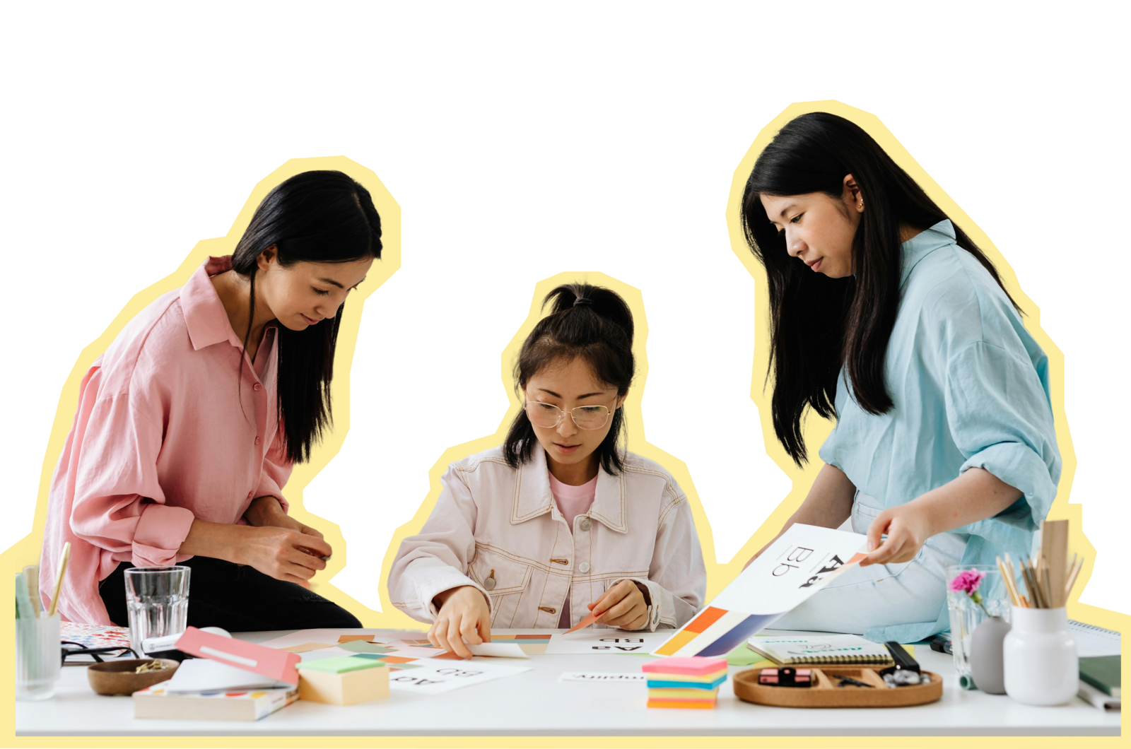 3 women working together on creative projects
