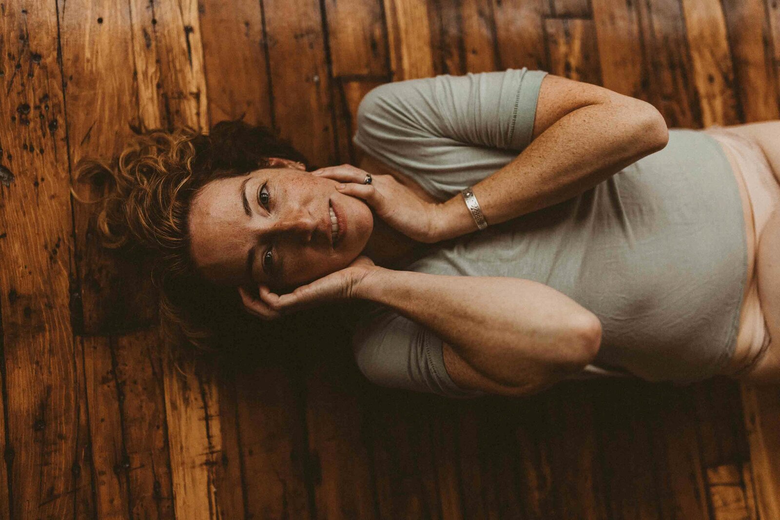 woman laying down on the floor