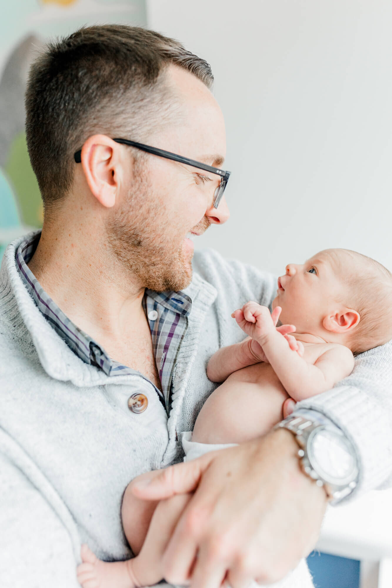 Dad and his newborn smile at each other at Boston Children's Hospital