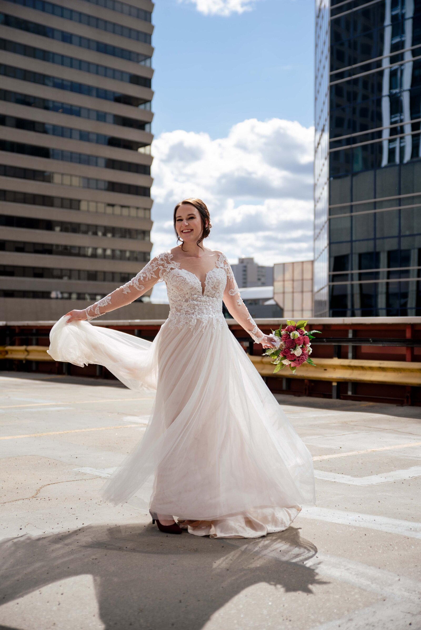 bride twirling rooftop